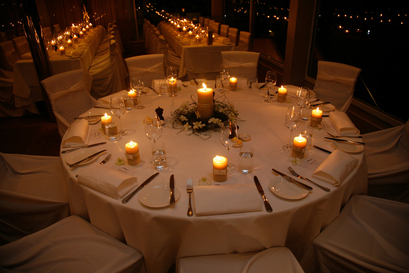 An eco wedding lit by honeycomb pillars