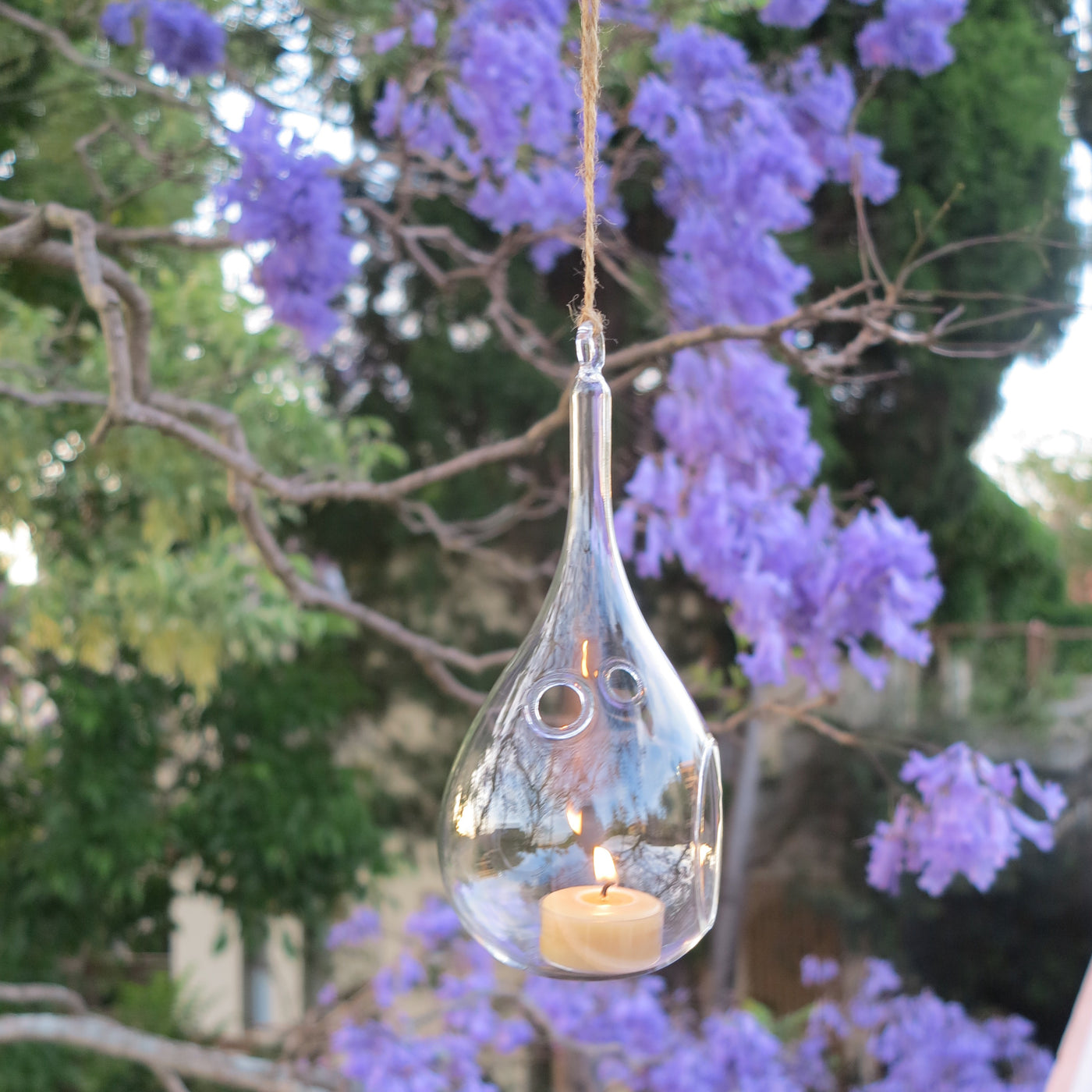 Hanging glass teardrop candle holders - lighting outdoor areas